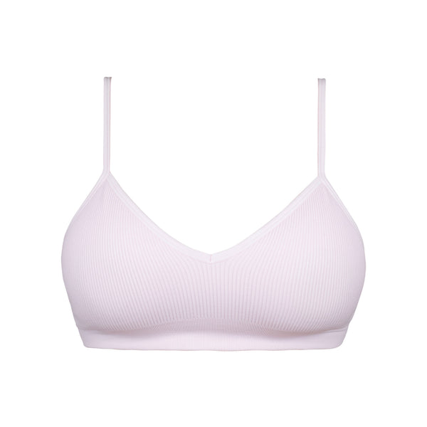 front of light pink bralette