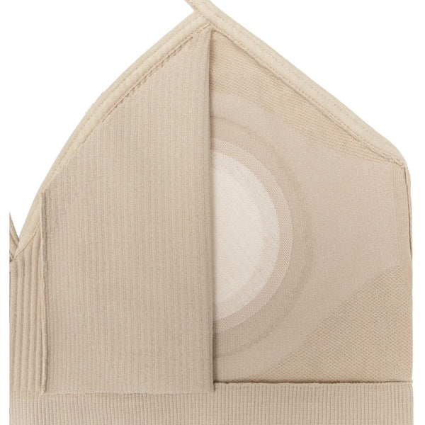 Interior view of an NDA bra highlighting the permanently sealed Concealing Petal for worry-free modesty without padding.