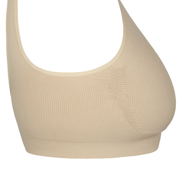 Side view of Gigi Nude Seamless Wireless Bralette highlighting extended sizes and seamless fit.