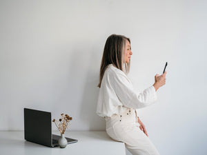 older woman looking at her phone