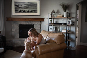 girl petting her dog