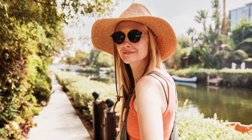 The Perfect Bra for Small Chests - woman looking over her shoulder smiling