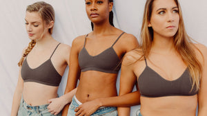 three young women in seamless, wireless, nipple concealing bralettes